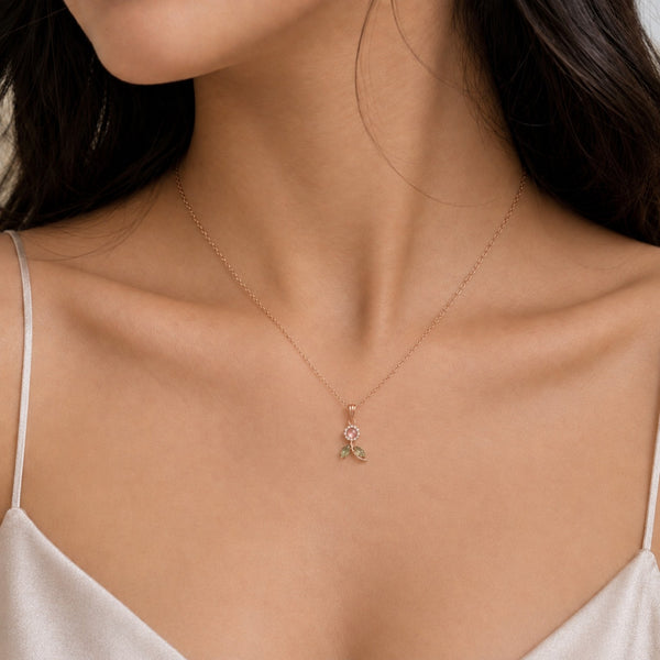 Elegant rose gold floral pendant artificial necklace worn by model